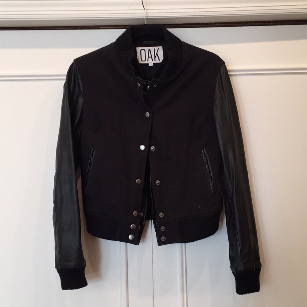 Black members only jacket by OAK. Leather arms